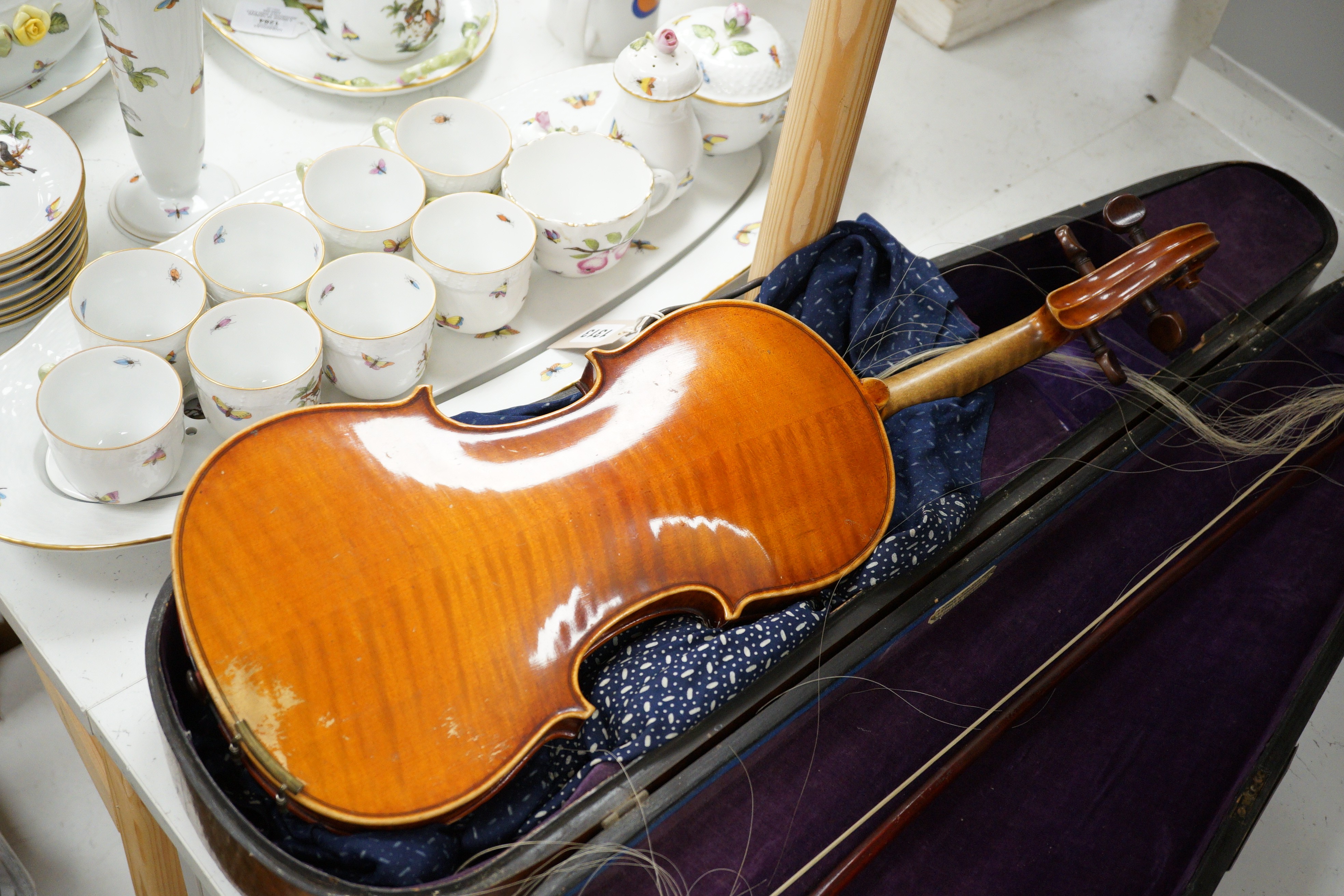 A violin with interior label reading ‘Copy of Richard Duke Fecit Dresdae: Anno 1889’ together with rosewood case. Back measures 36cm